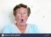 elderly-woman-looking-amazed-or-surprised-XAJG98.jpg