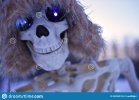 grinning-skeleton-close-up-image-wearing-fur-lined-hat-162352135.jpg
