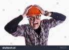 stock-photo-a-desperated-contractor-with-a-funny-expression-63754201.jpg