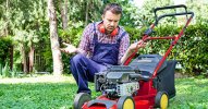 man-lawnmower-broken-petrol-small.jpg