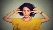 woman-fingers-in-ears-small.jpg