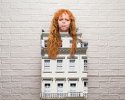 woman-dressed-as-mansion-small.jpg